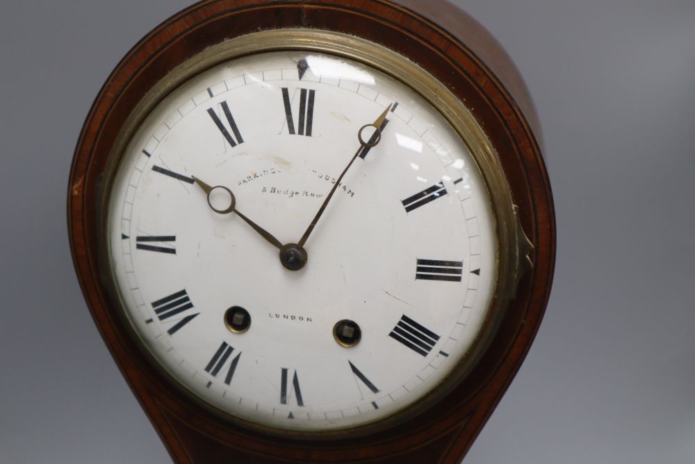 A mahogany balloon cased clock, with French movement, height 40cm